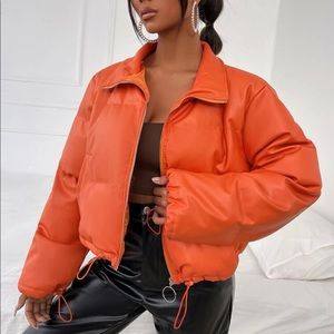 Orange drawstring puffer cropped